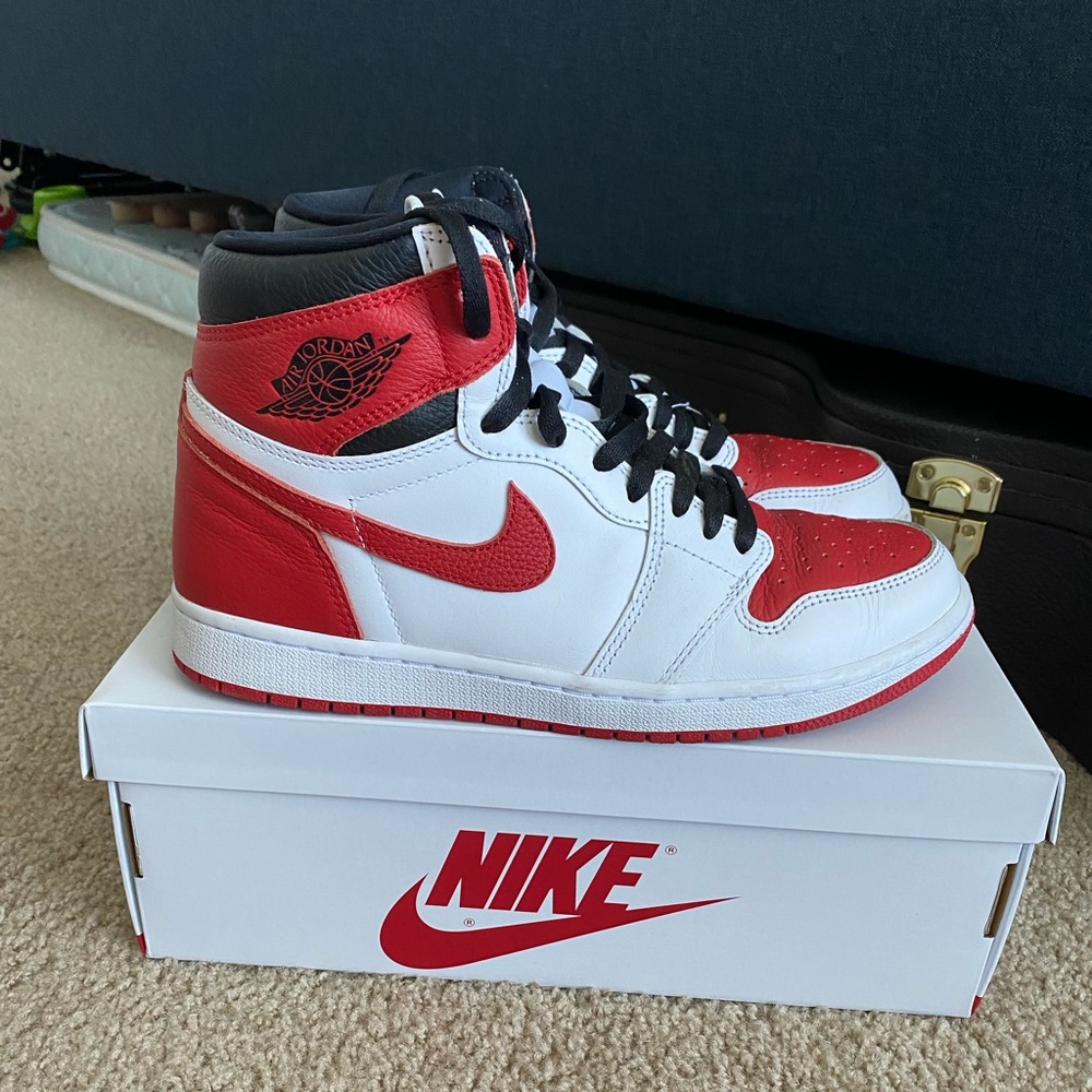 Size 9 Jordan 1s in white/university red.